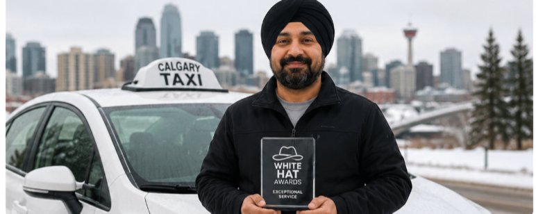 Calgary taxi driver Hardeep Singh Toor standing beside his cab after being honored with a Tourism Calgary award for helping deliver a baby during a severe winter snowstorm.